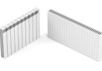 Different types of heating radiators on white background